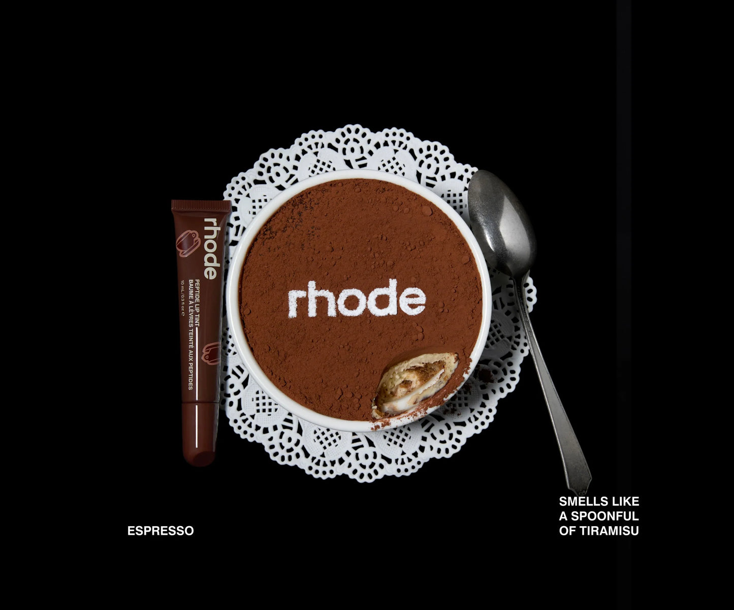 Rhode chocolate product with a spoon and doily on a black background