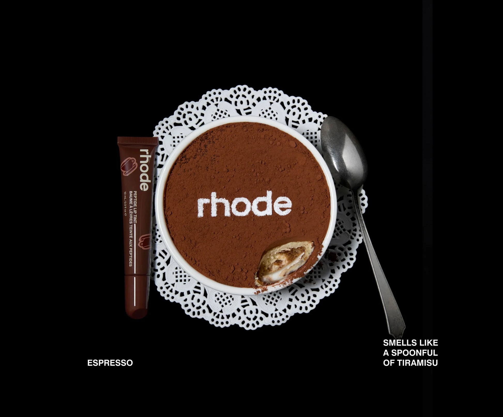 Rhode chocolate product with a spoon and doily on a black background